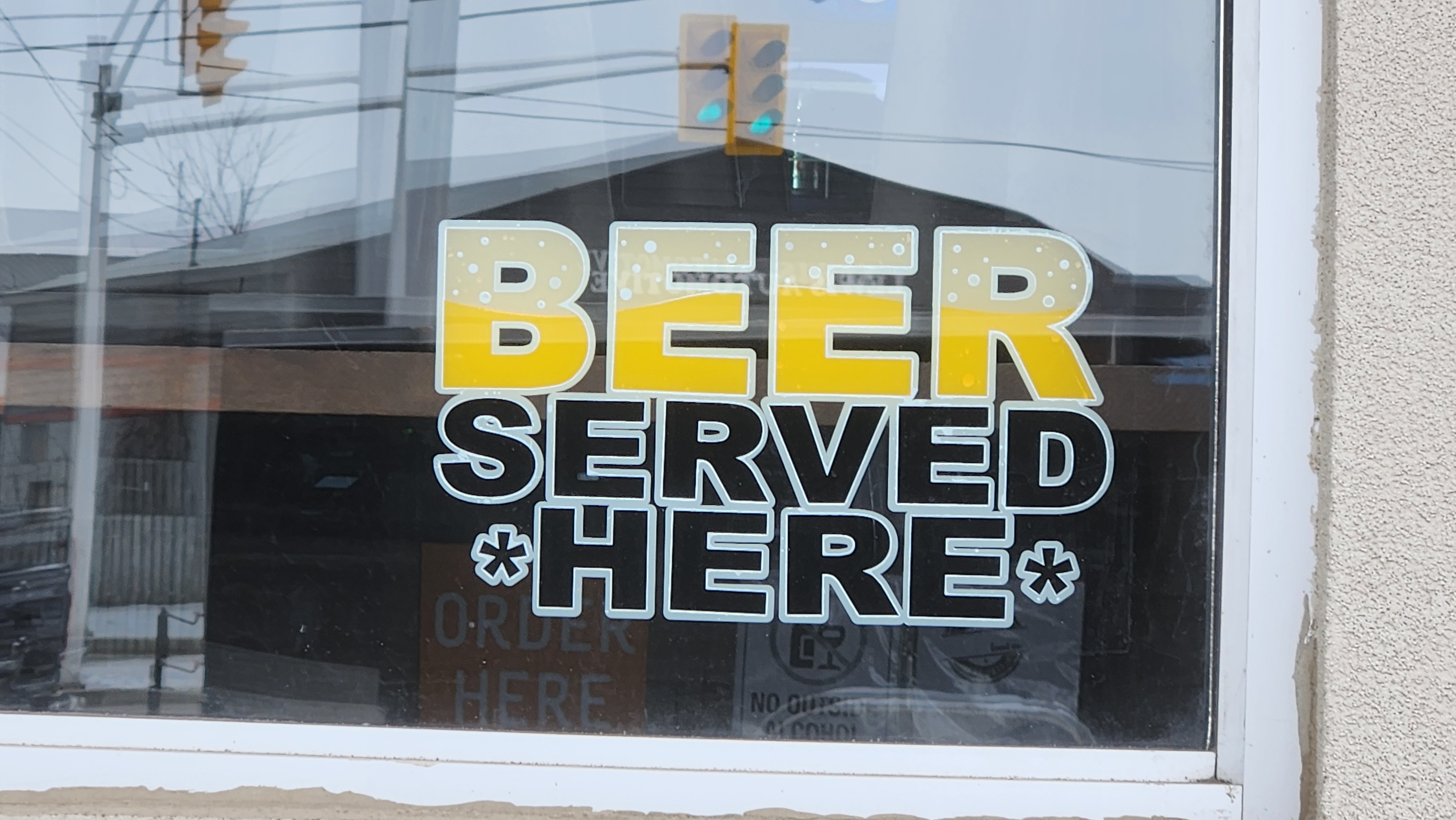 Restaurant sign selling beer